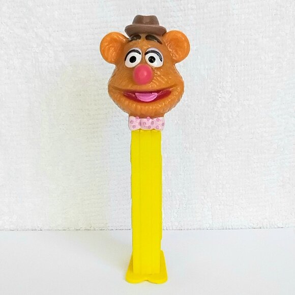 3/$24 NM/M The Muppets Fozzie Bear on Yellow PEZ Dispenser!! - Picture 1 of 5
